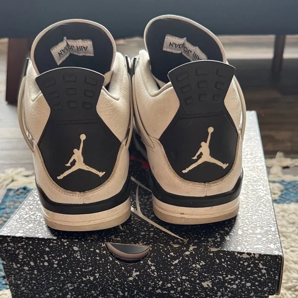 Air Jordan 4 Retro White and Black Sneakers
